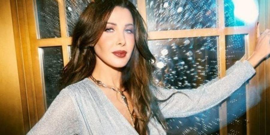 نانسي عجرم تهدي أغنية طول عمري نجمة للراحل محمد رحيم: آخر تعاون بينا - اخبارك الان